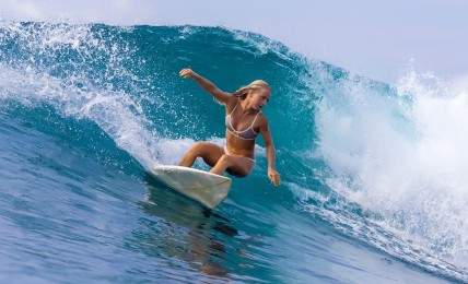 Surfing Tahiti
